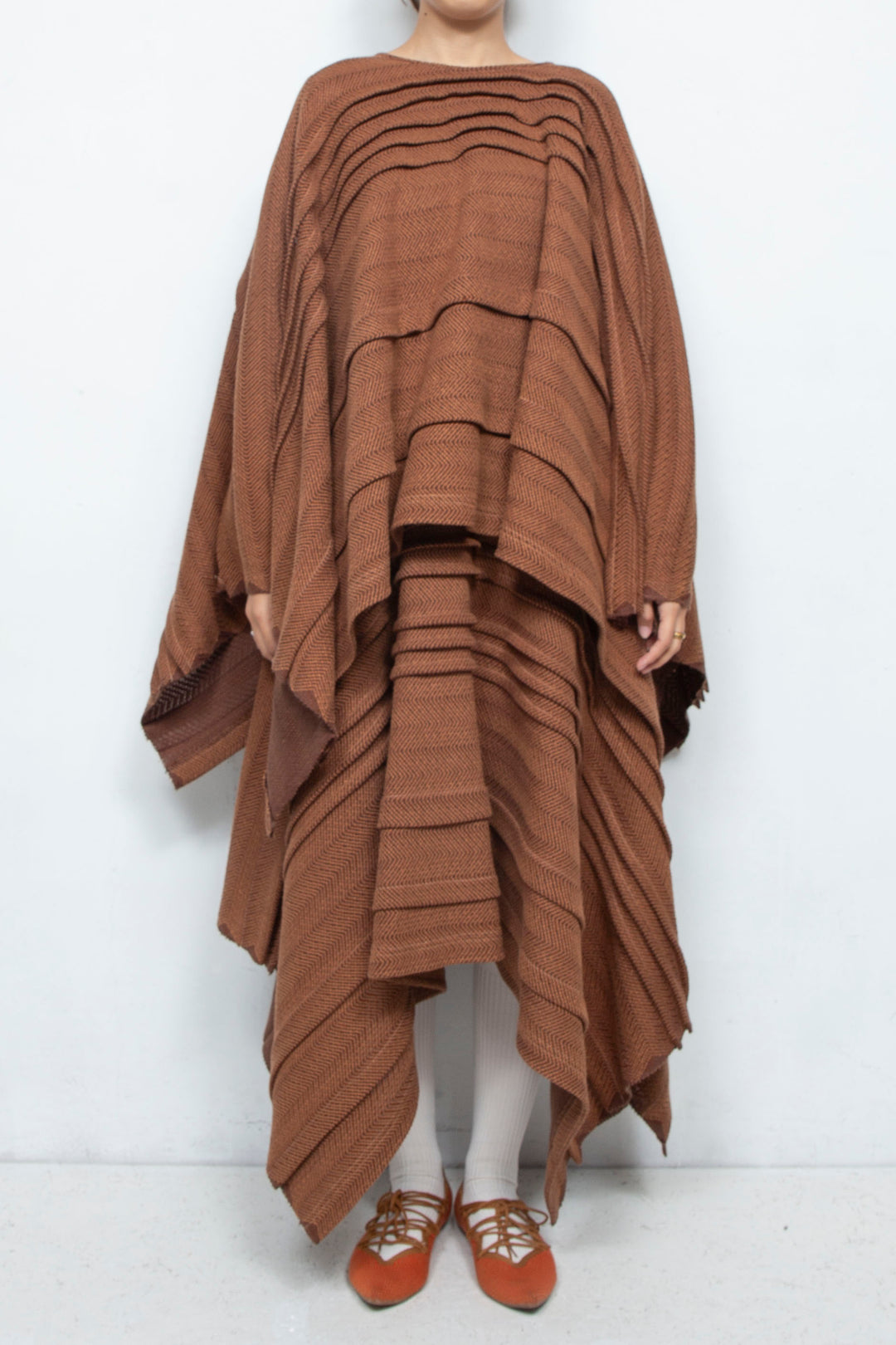 tuck poncho brown