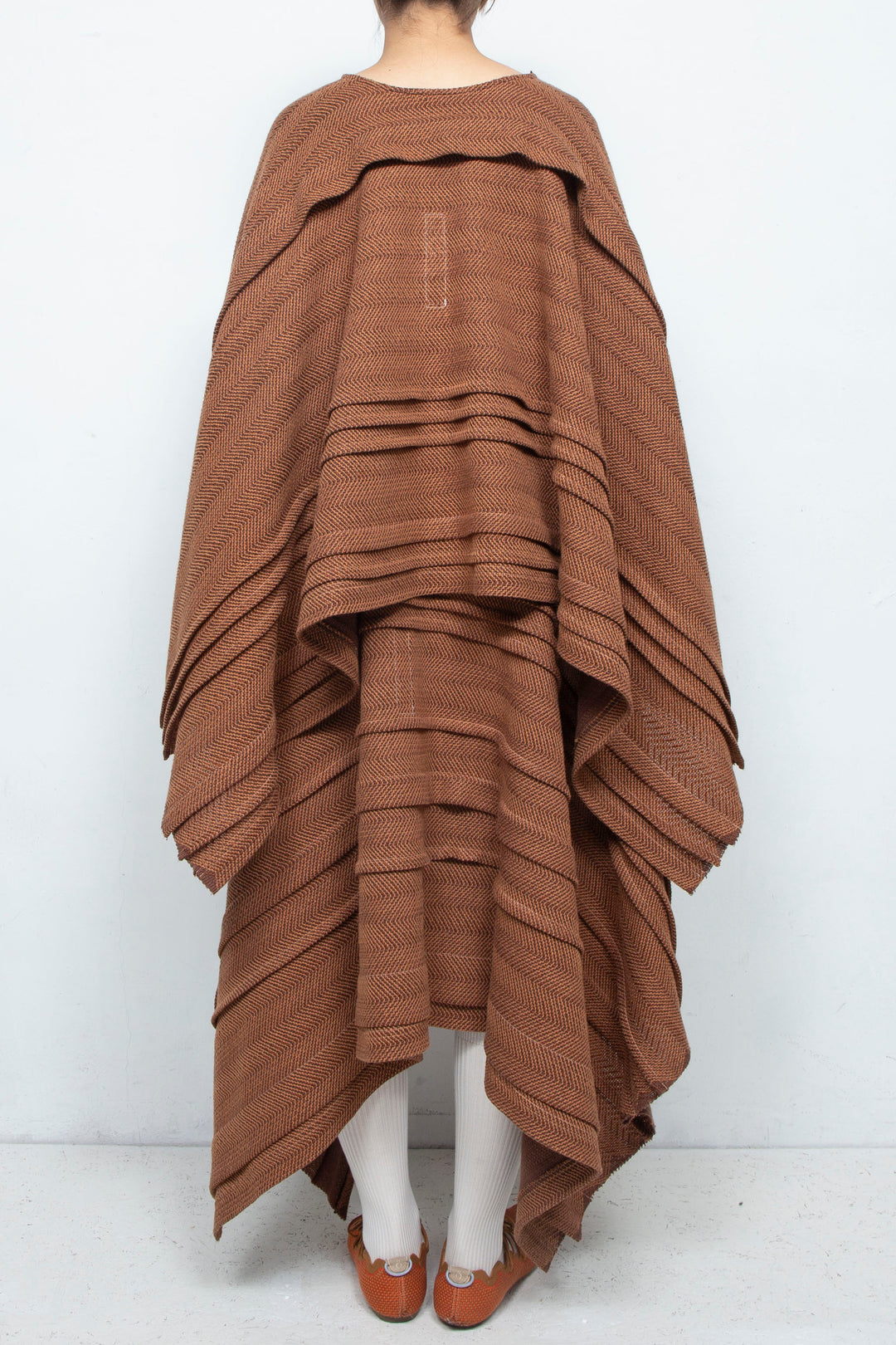 tuck poncho brown