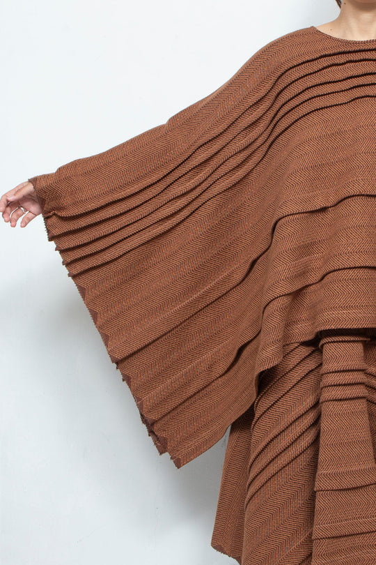 tuck poncho brown