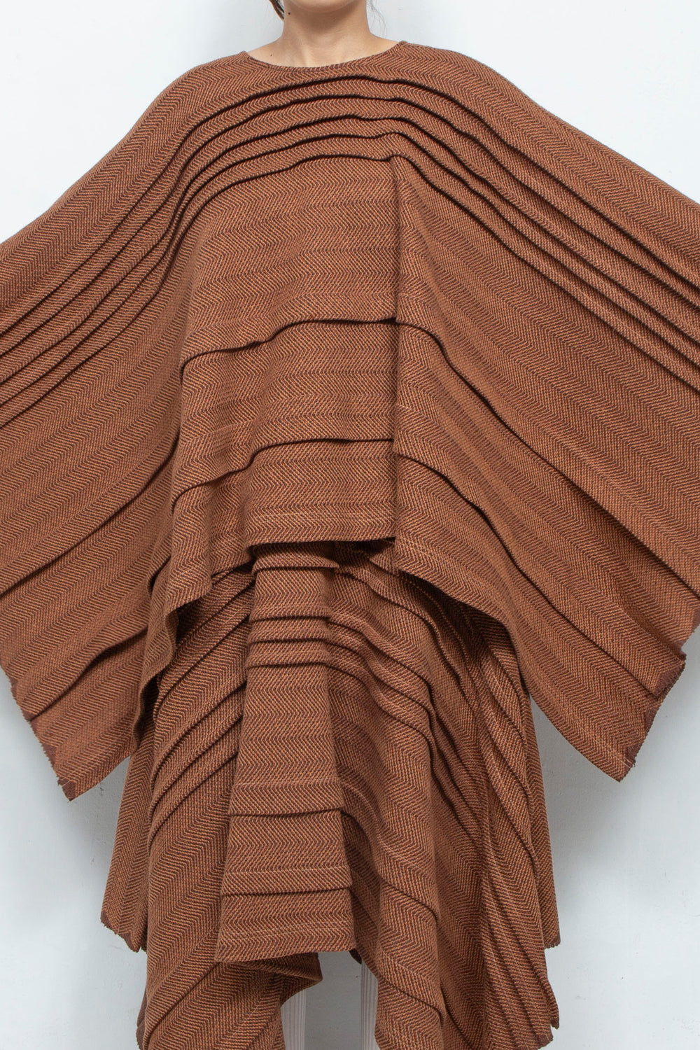 tuck poncho brown