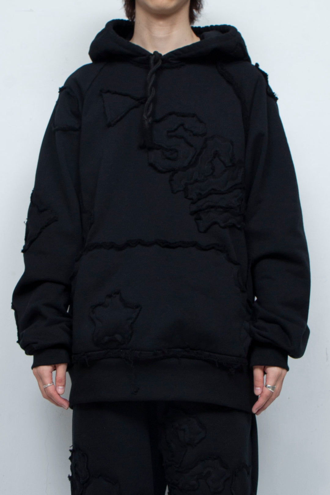 Multi-pattern raw edge sweat hoodie BLACK
