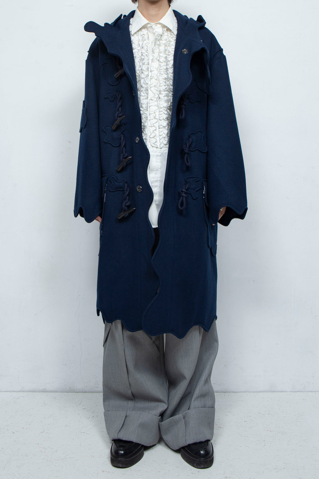 Melting monster duffel coat