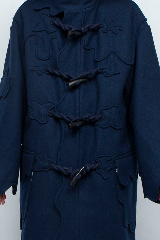 Melting monster duffel coat