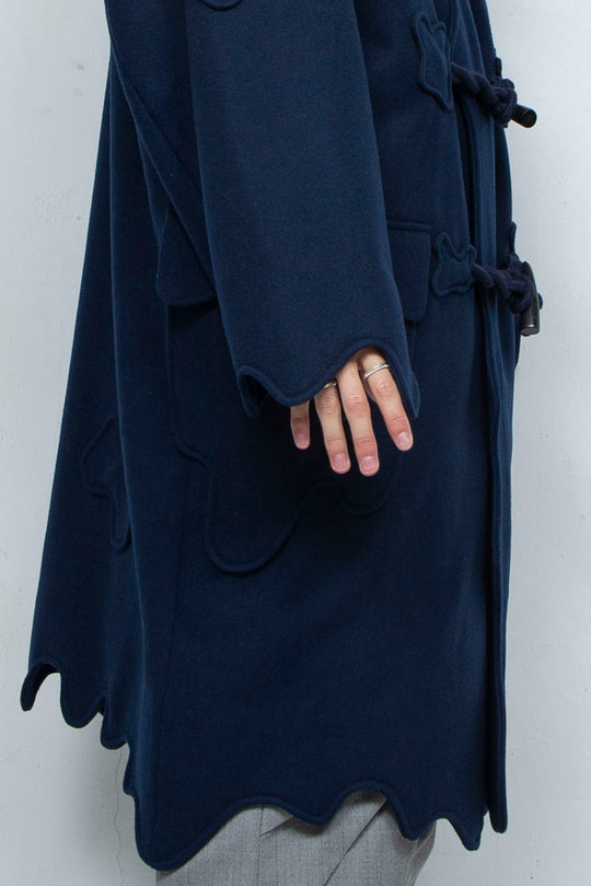 Melting monster duffel coat
