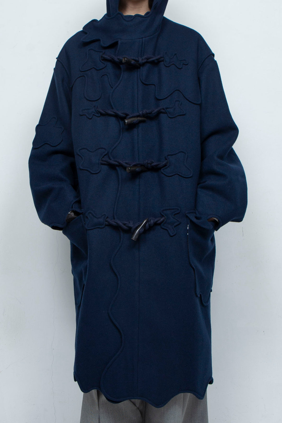 Melting monster duffel coat