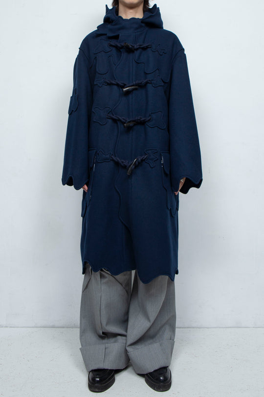 Melting monster duffel coat