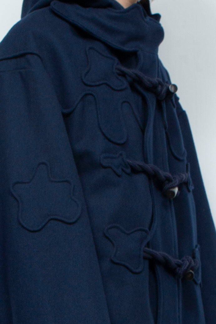 Melting monster duffel coat