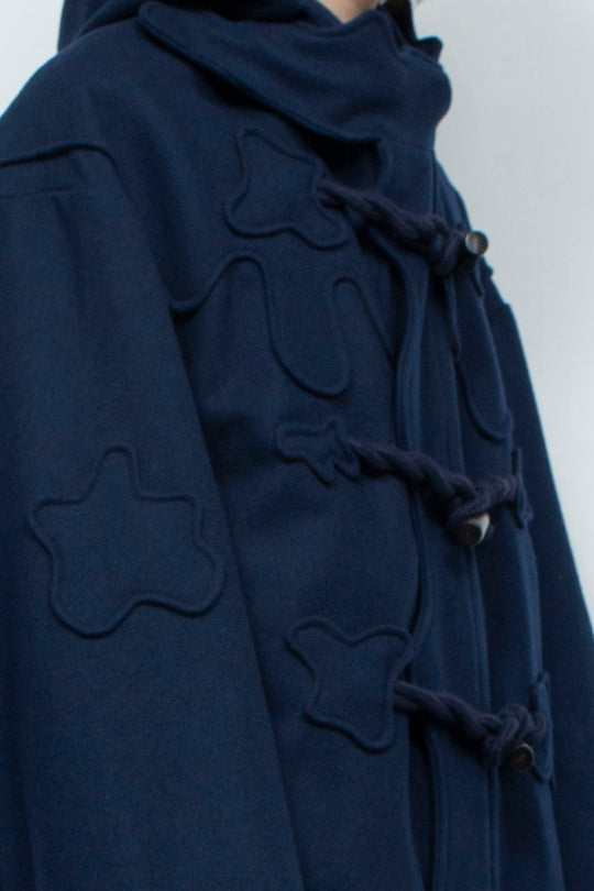 Melting monster duffel coat