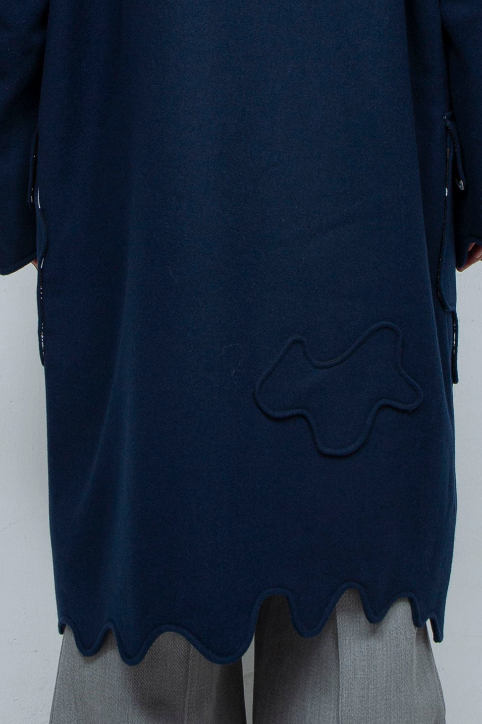 Melting monster duffel coat