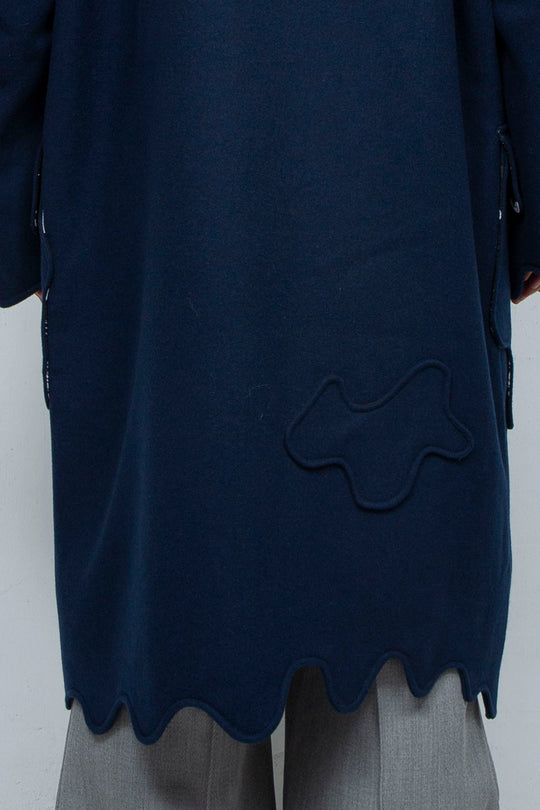 Melting monster duffel coat