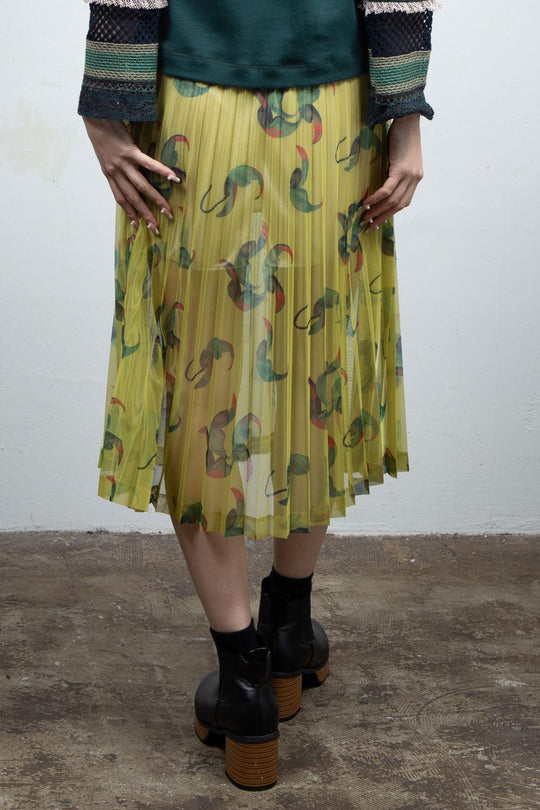 Yellow pleated skirt