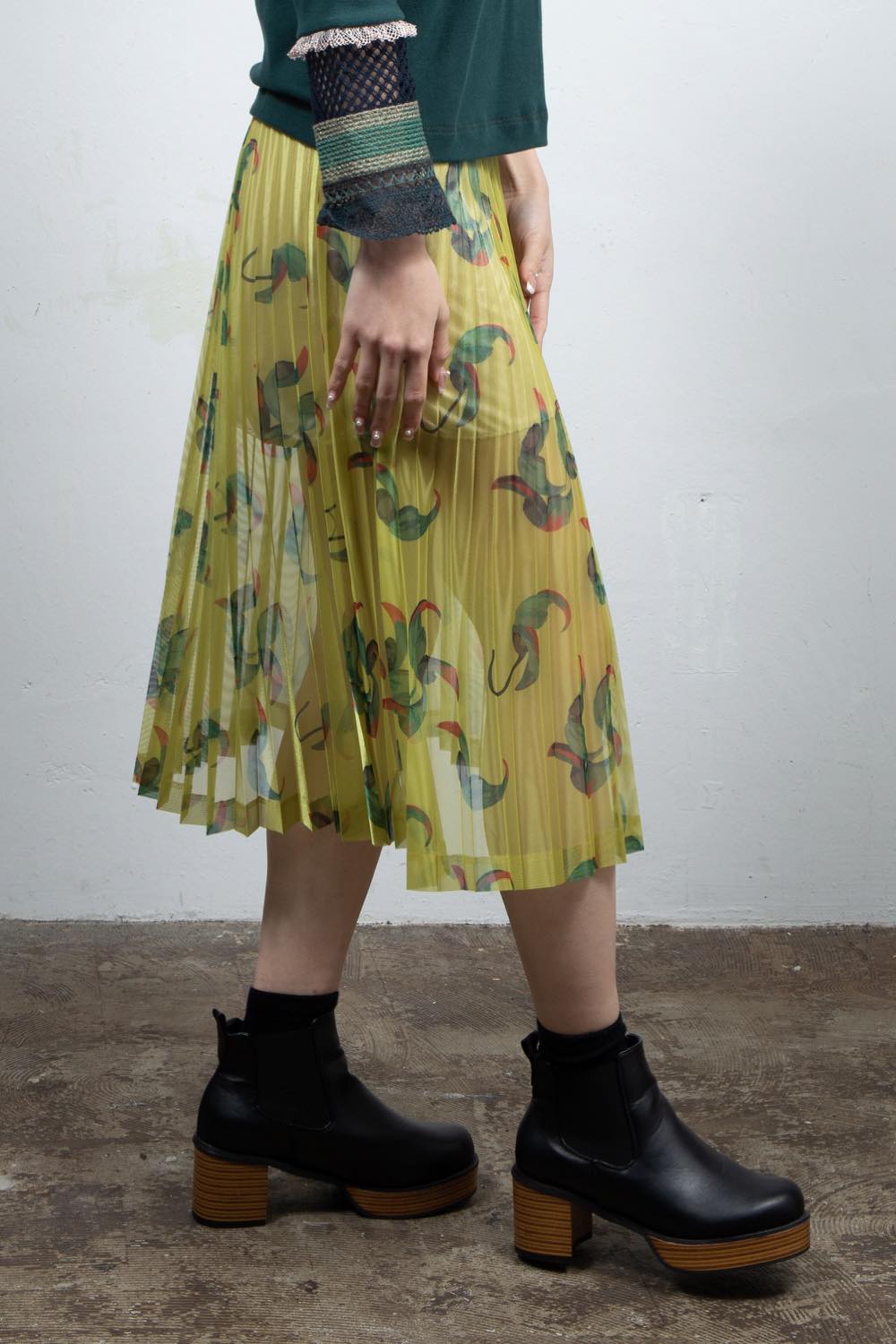 Yellow pleated skirt