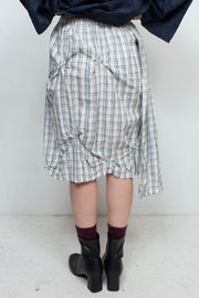 Asymmetric check skirt