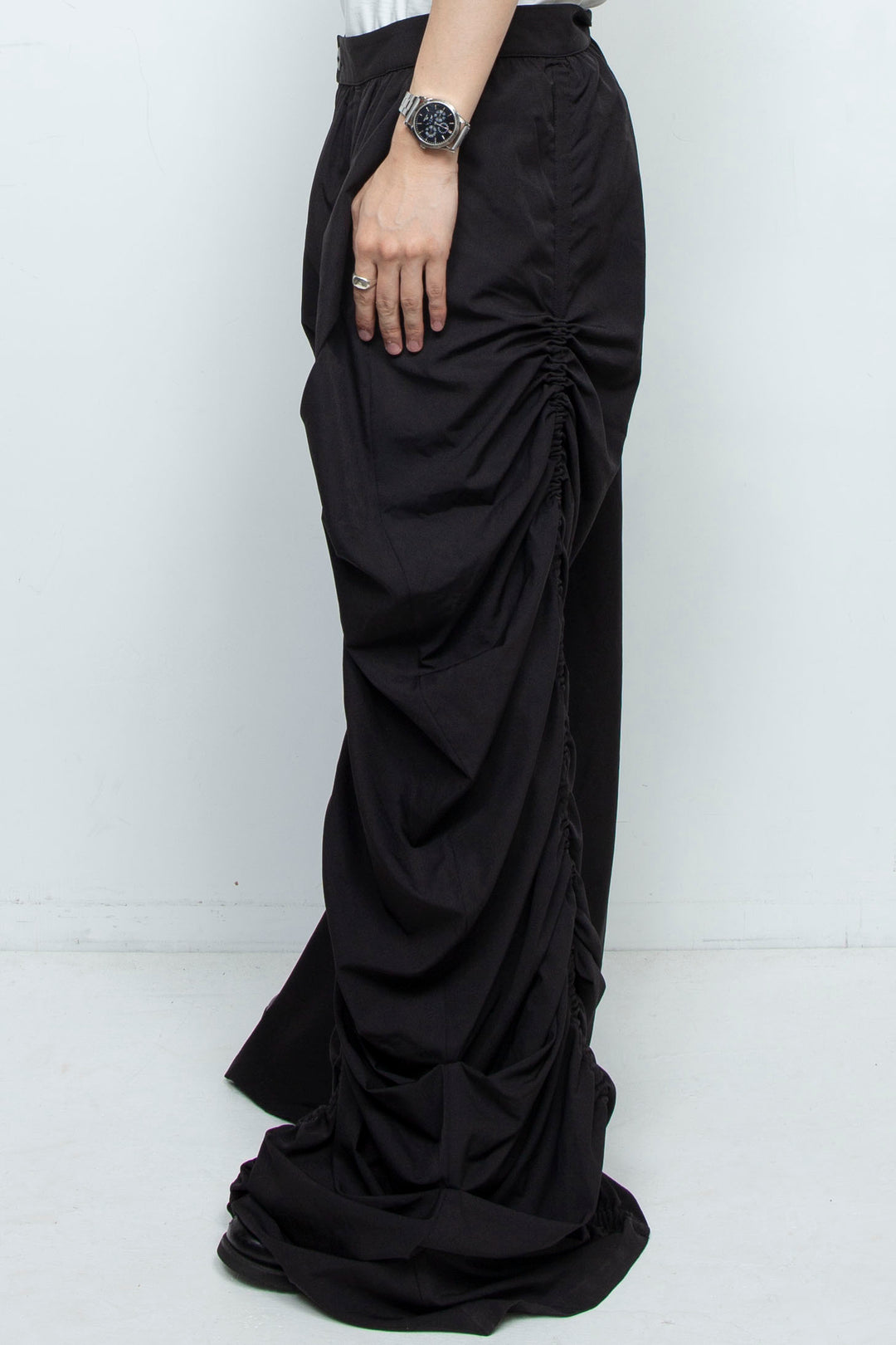 BLACK WIDE-LEG ASYMMETRIC GATHERED PANEL TROUSERS