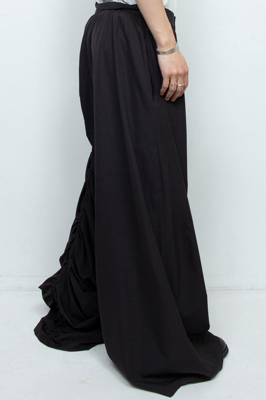 BLACK WIDE-LEG ASYMMETRIC GATHERED PANEL TROUSERS