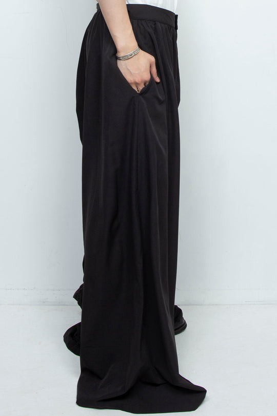 BLACK WIDE-LEG ASYMMETRIC GATHERED PANEL TROUSERS