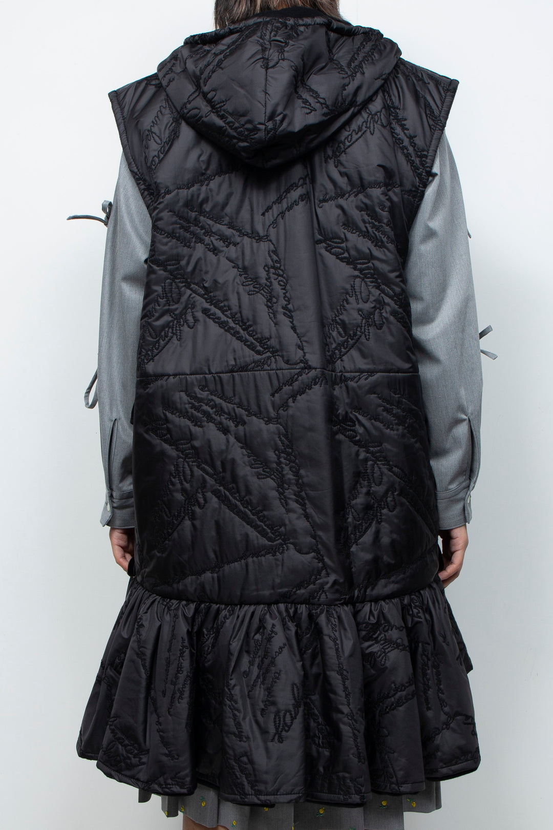 Quilting ruffled gilet