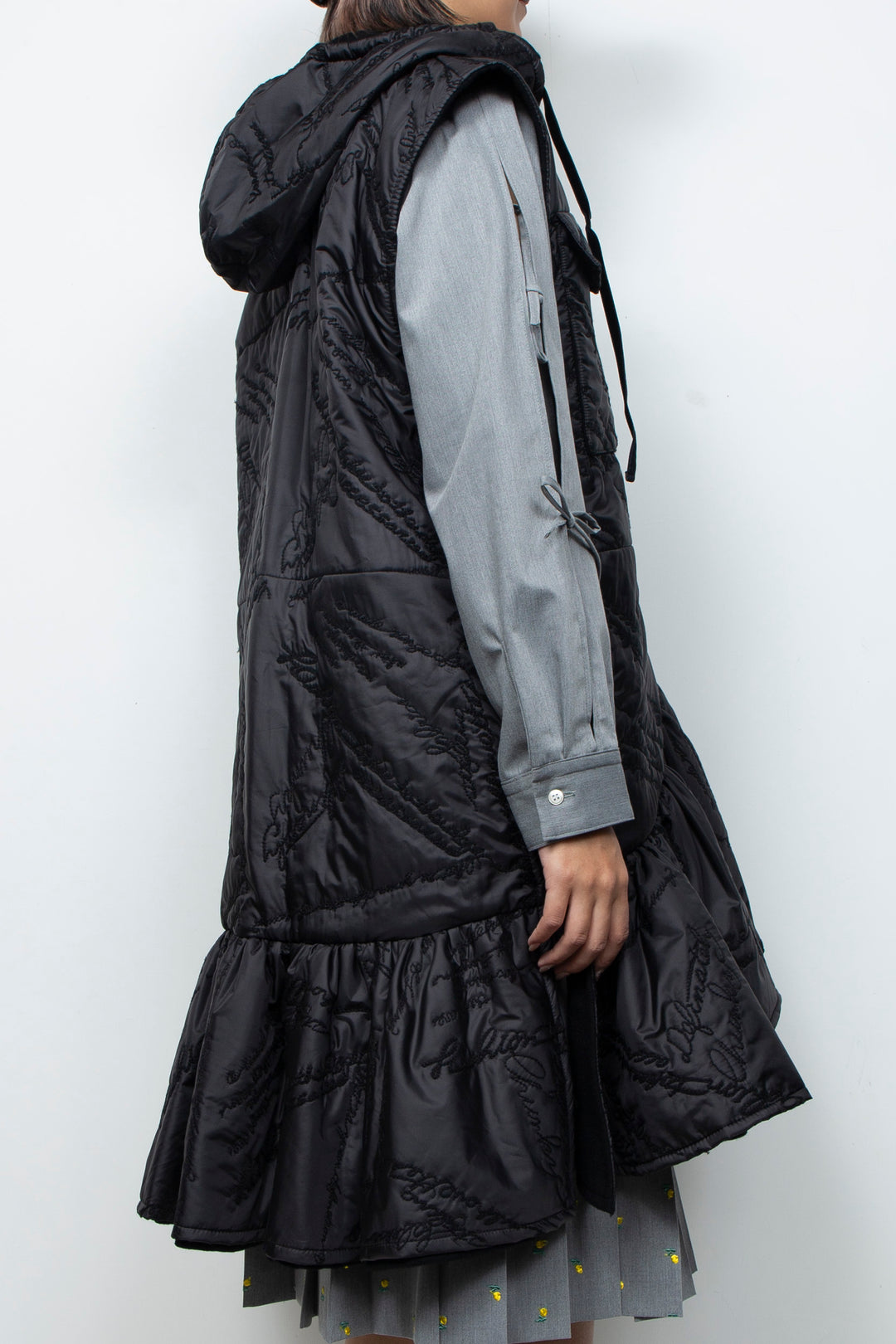 Quilting ruffled gilet