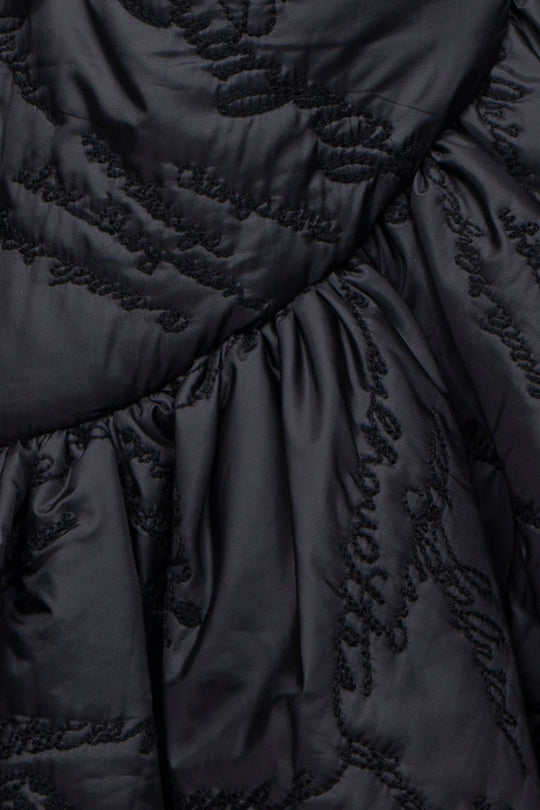 Quilting ruffled gilet