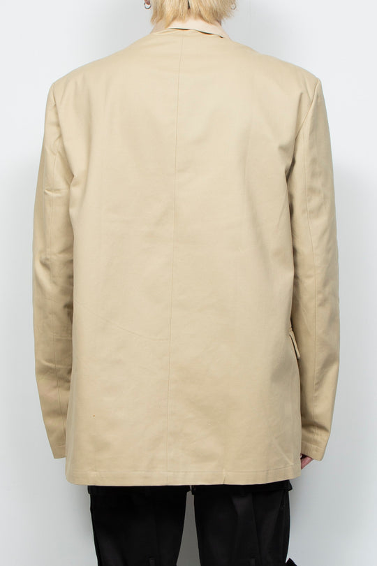 Beige double-layer suit with ruffles