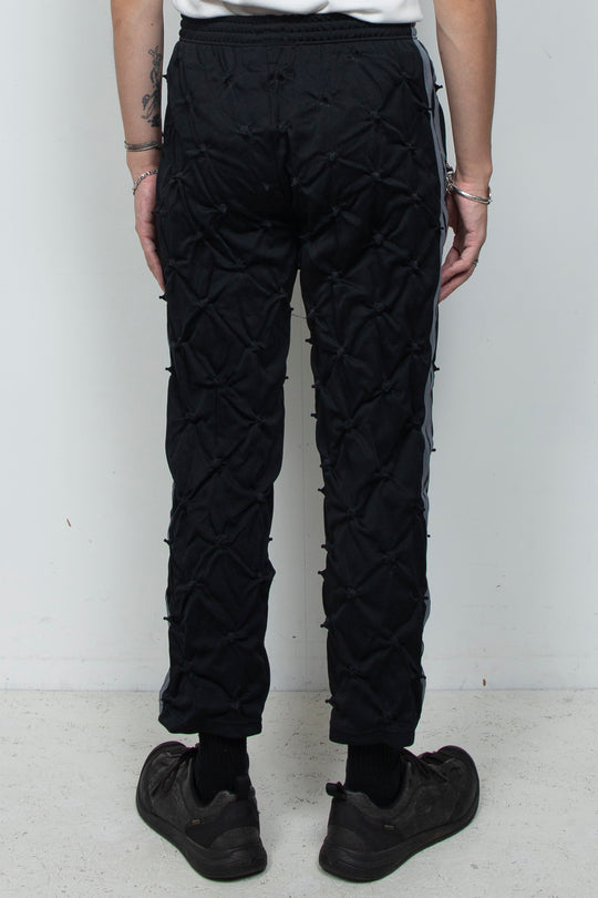 STUCK IN TRADITION TRACK PANTS BLACK