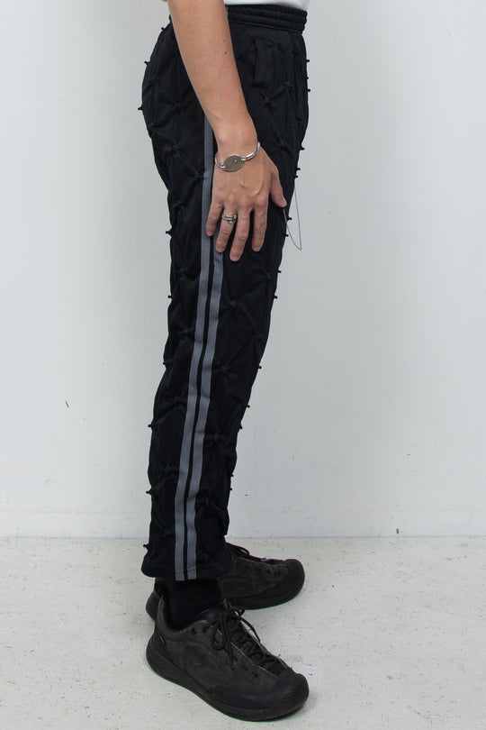 STUCK IN TRADITION TRACK PANTS BLACK