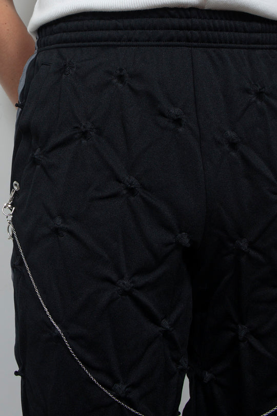 STUCK IN TRADITION TRACK PANTS BLACK