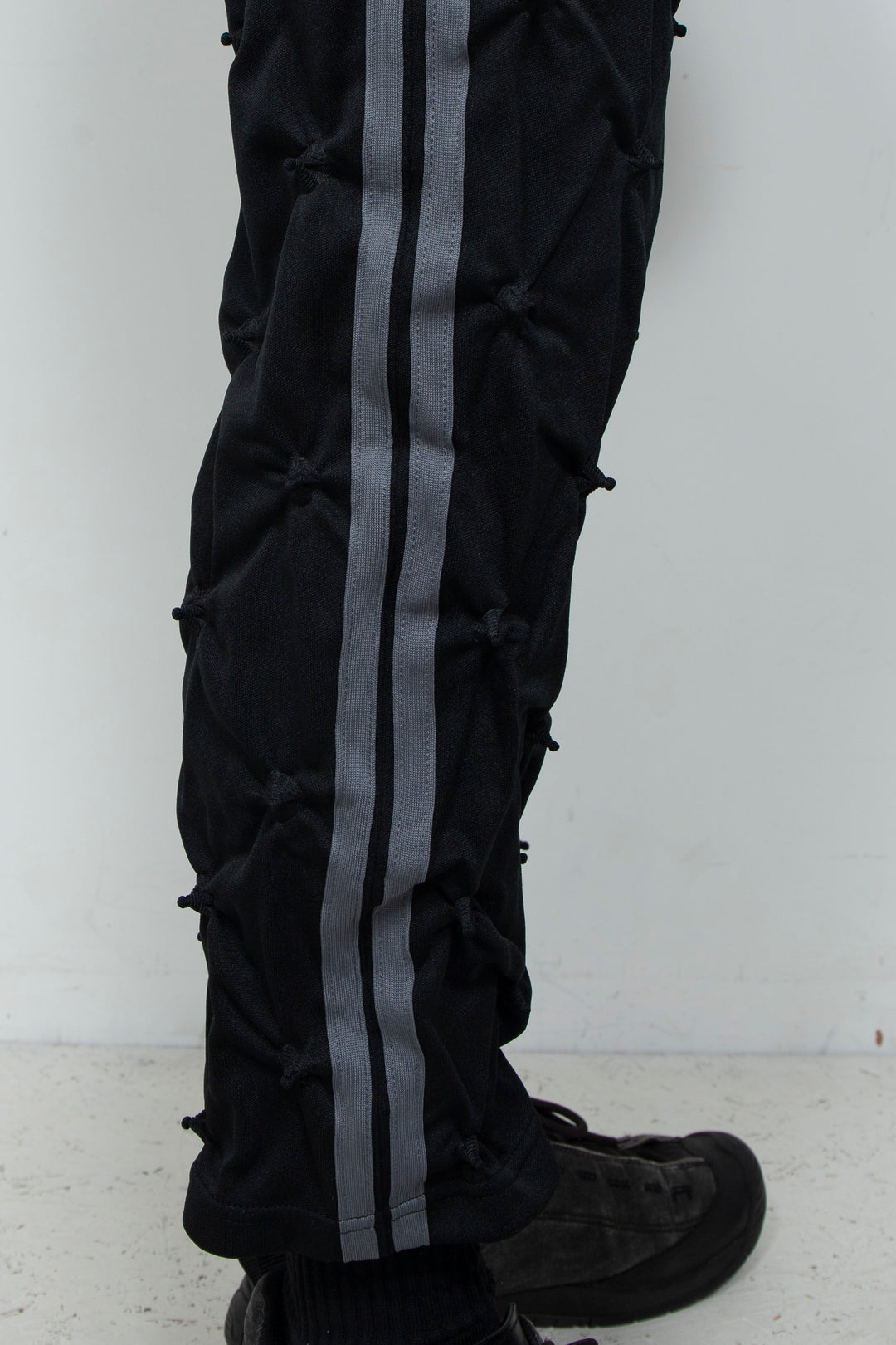 STUCK IN TRADITION TRACK PANTS BLACK