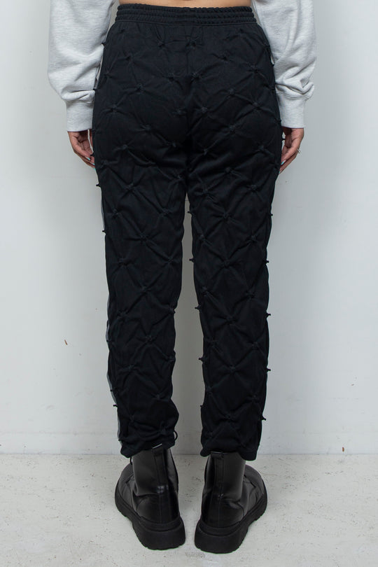 STUCK IN TRADITION TRACK PANTS BLACK