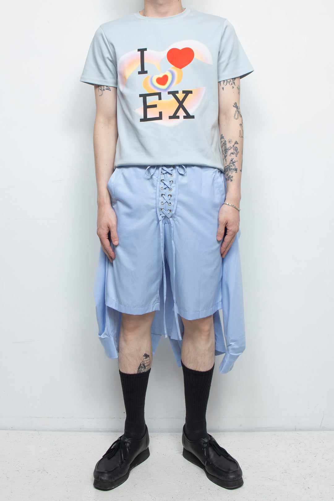 Light blue two piece shirt with strap shorts