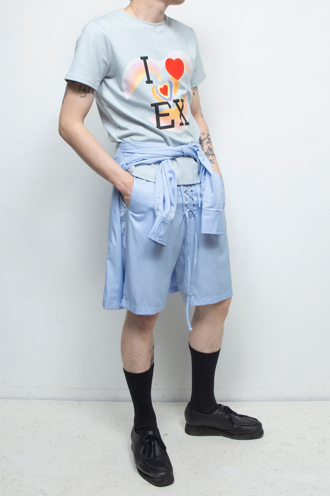 Light blue two piece shirt with strap shorts