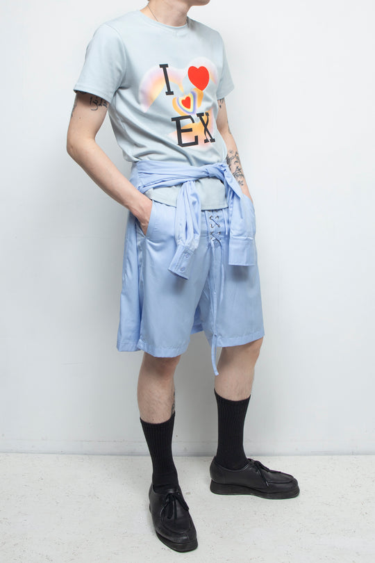 Light blue two piece shirt with strap shorts