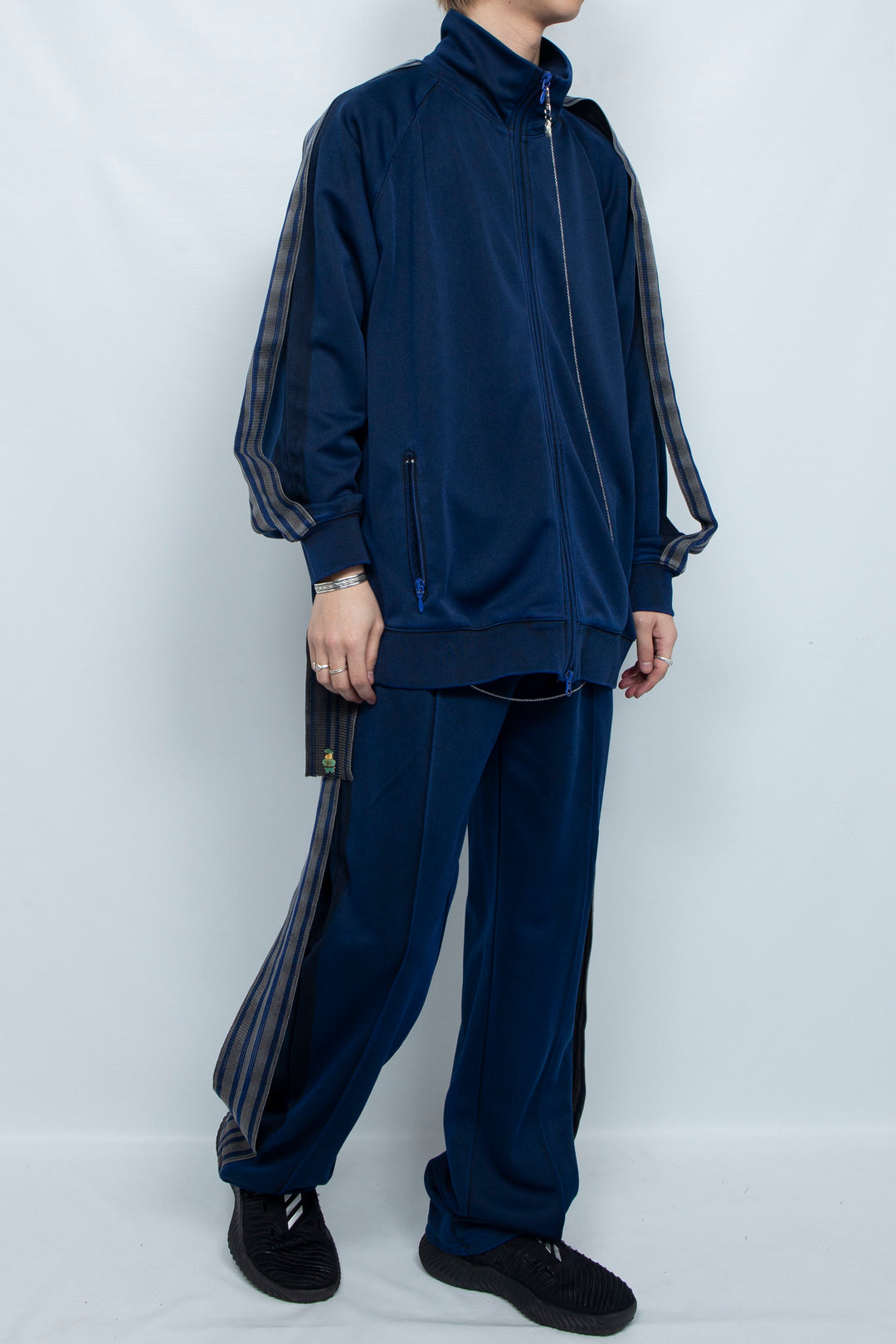 PIGMENT-DYED DISTRESSED TRACK TROUSERS BLUE