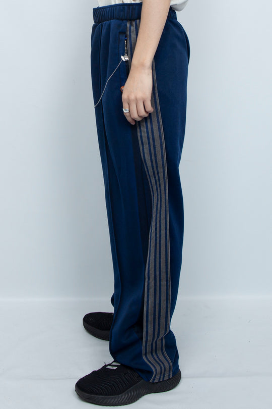 PIGMENT-DYED DISTRESSED TRACK TROUSERS BLUE