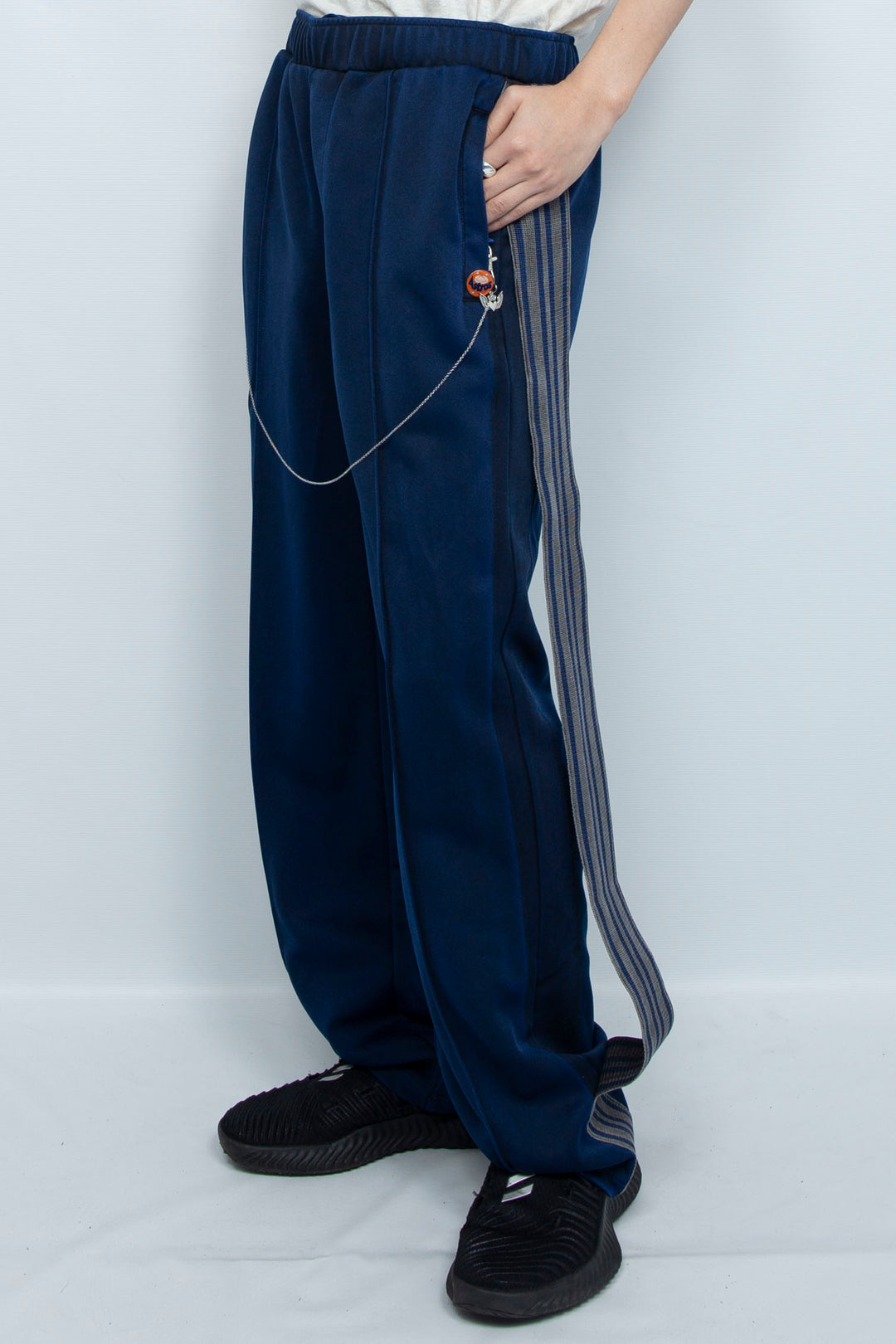 PIGMENT-DYED DISTRESSED TRACK TROUSERS BLUE