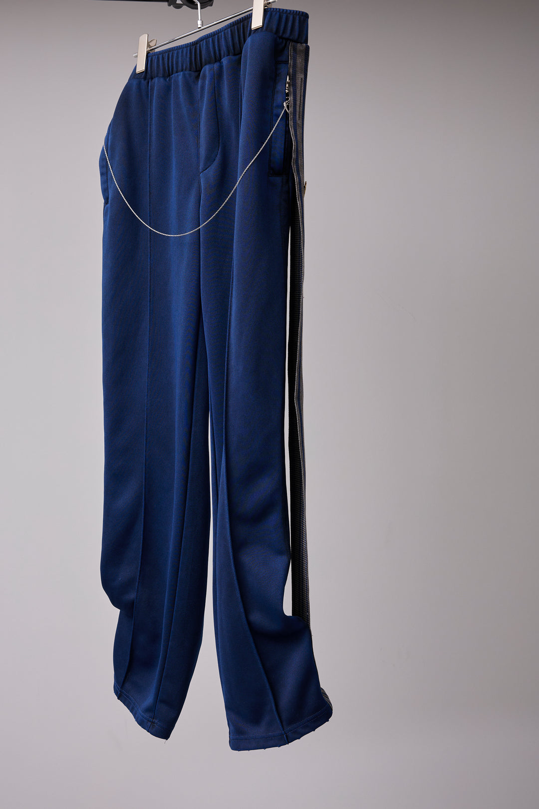 PIGMENT-DYED DISTRESSED TRACK TROUSERS BLUE