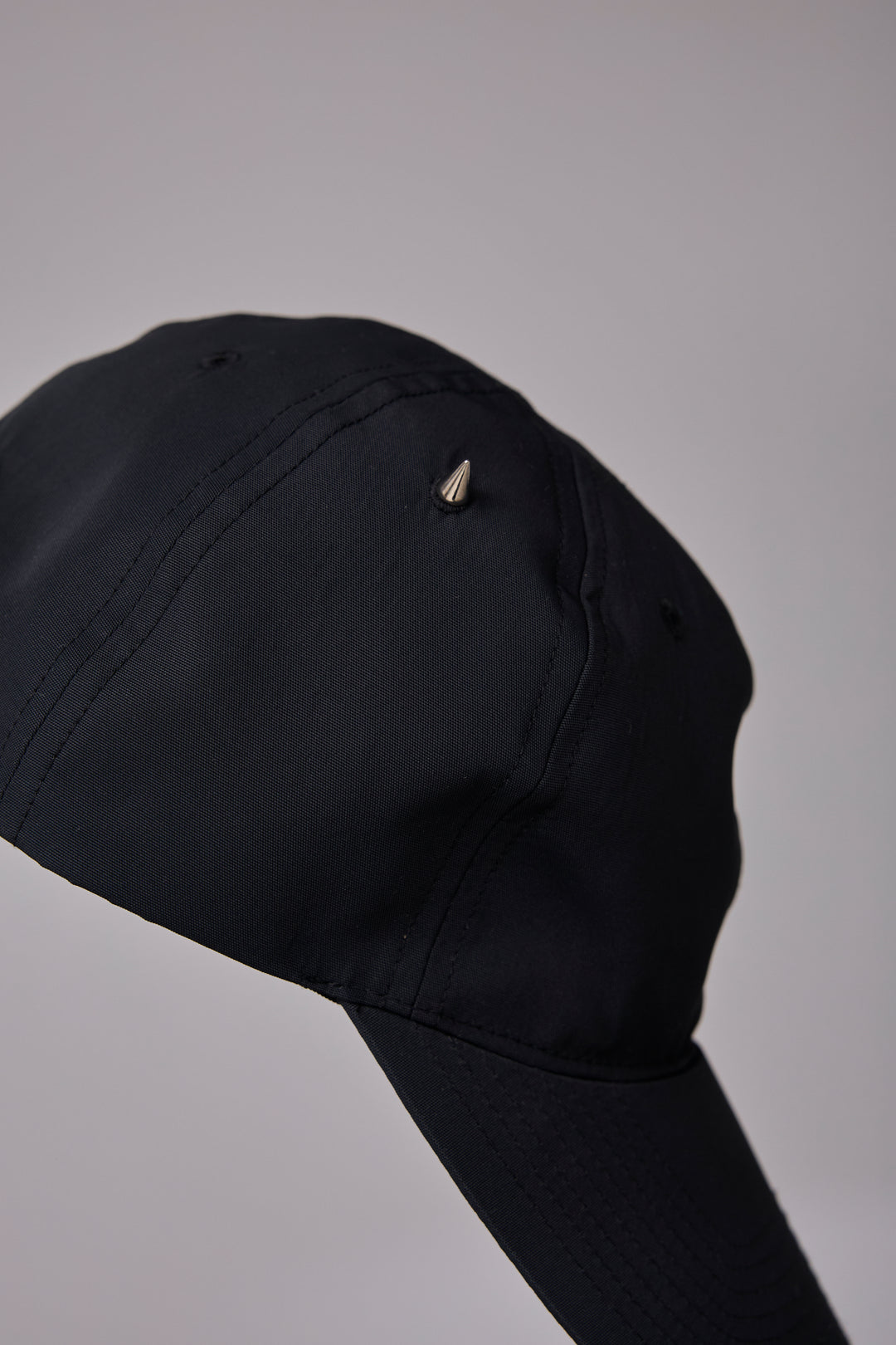 METAL-LIKE SHAPE MEMORY CAP BLACK